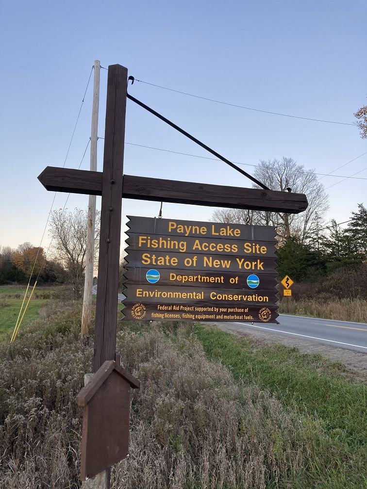 The Payne Lake fishing access site State of New York sign from the road